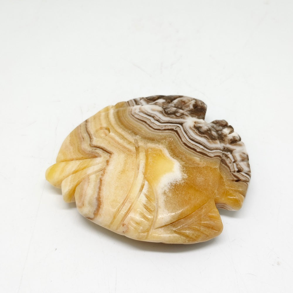 107.3g natural orange calcite fish carving ornaments healing